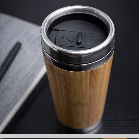 https://www.tumblerbulk.com/cdn/shop/products/16oz-bamboo-stainless-steel-bottle-coffee-mug-insulated-bamboo-travel-tumbler-eco-friendly-tea-cup-flask-825610_grande.jpg?v=1653966189