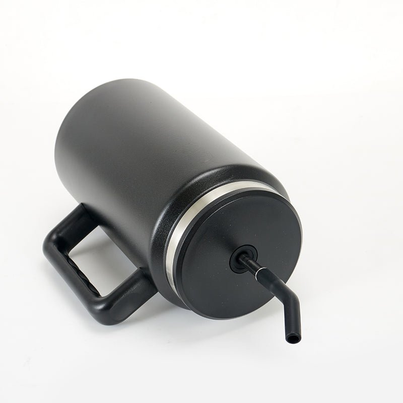 https://www.tumblerbulk.com/cdn/shop/products/50oz-stainless-steel-mug-insulated-tumbler-with-handle-and-straw-611640_1024x1024.jpg?v=1691711285