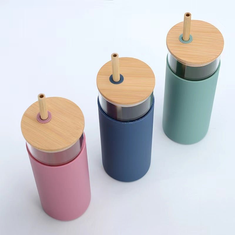 https://www.tumblerbulk.com/cdn/shop/products/case-of-25pk-16oz-glass-water-bottle-silicone-protective-sleeve-bamboo-lid-and-straw-299160_1024x1024.jpg?v=1666947637